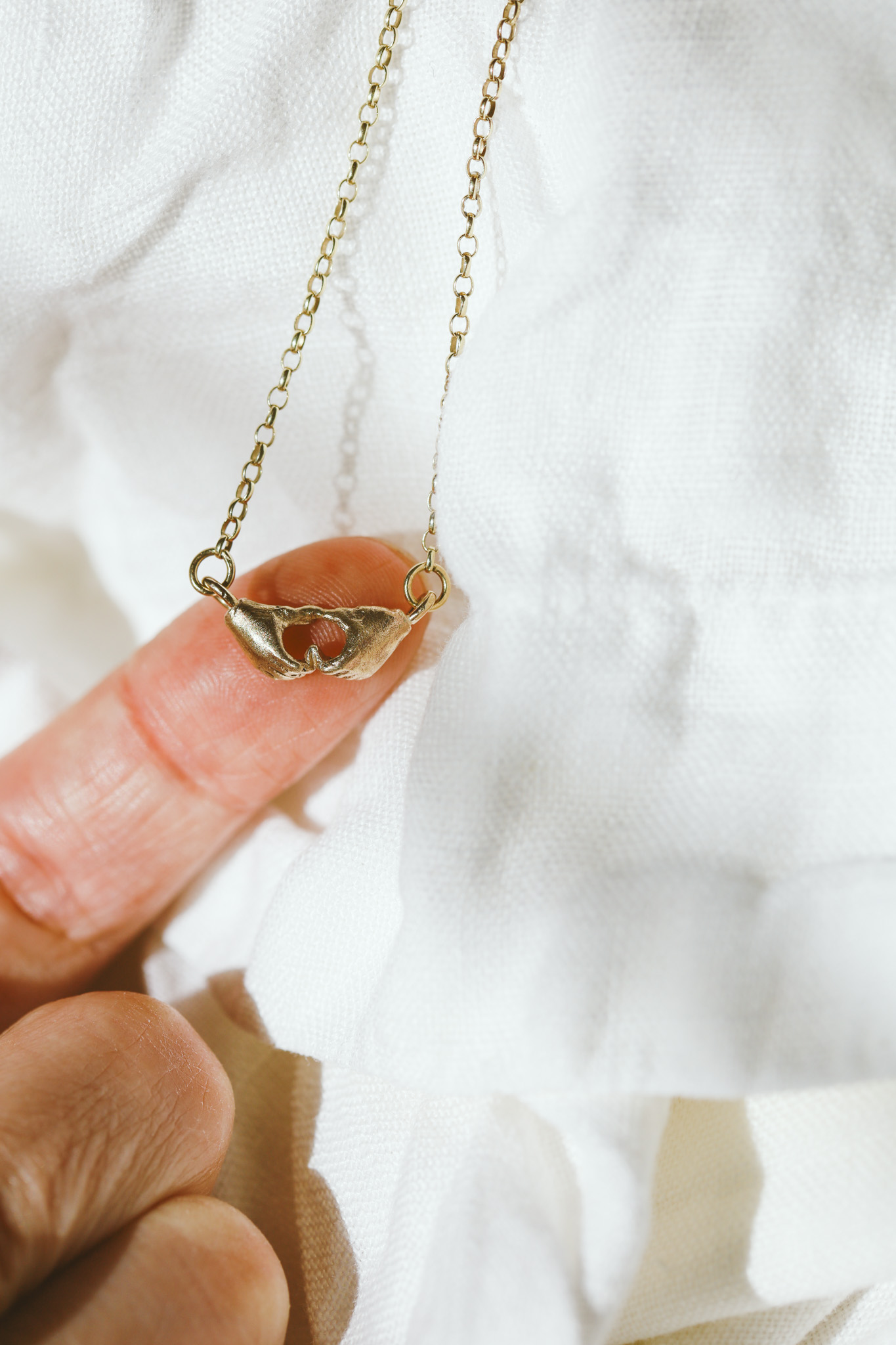 A Quiet Bond | Hand Heart Gold Necklace - Image 12
