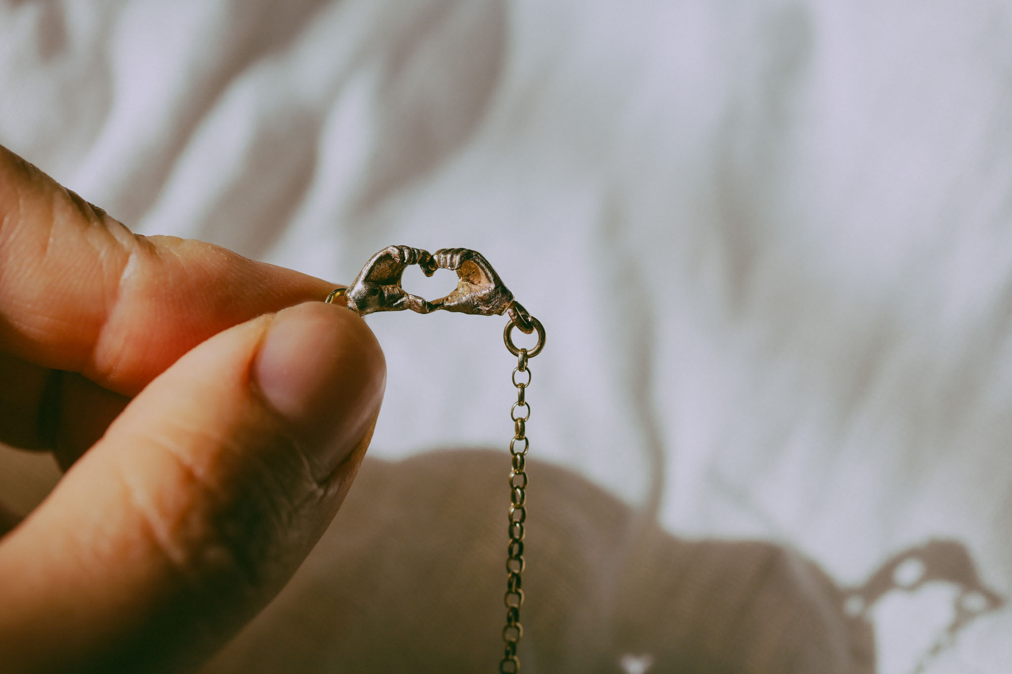 A Quiet Bond | Hand Heart Gold Necklace - Image 4