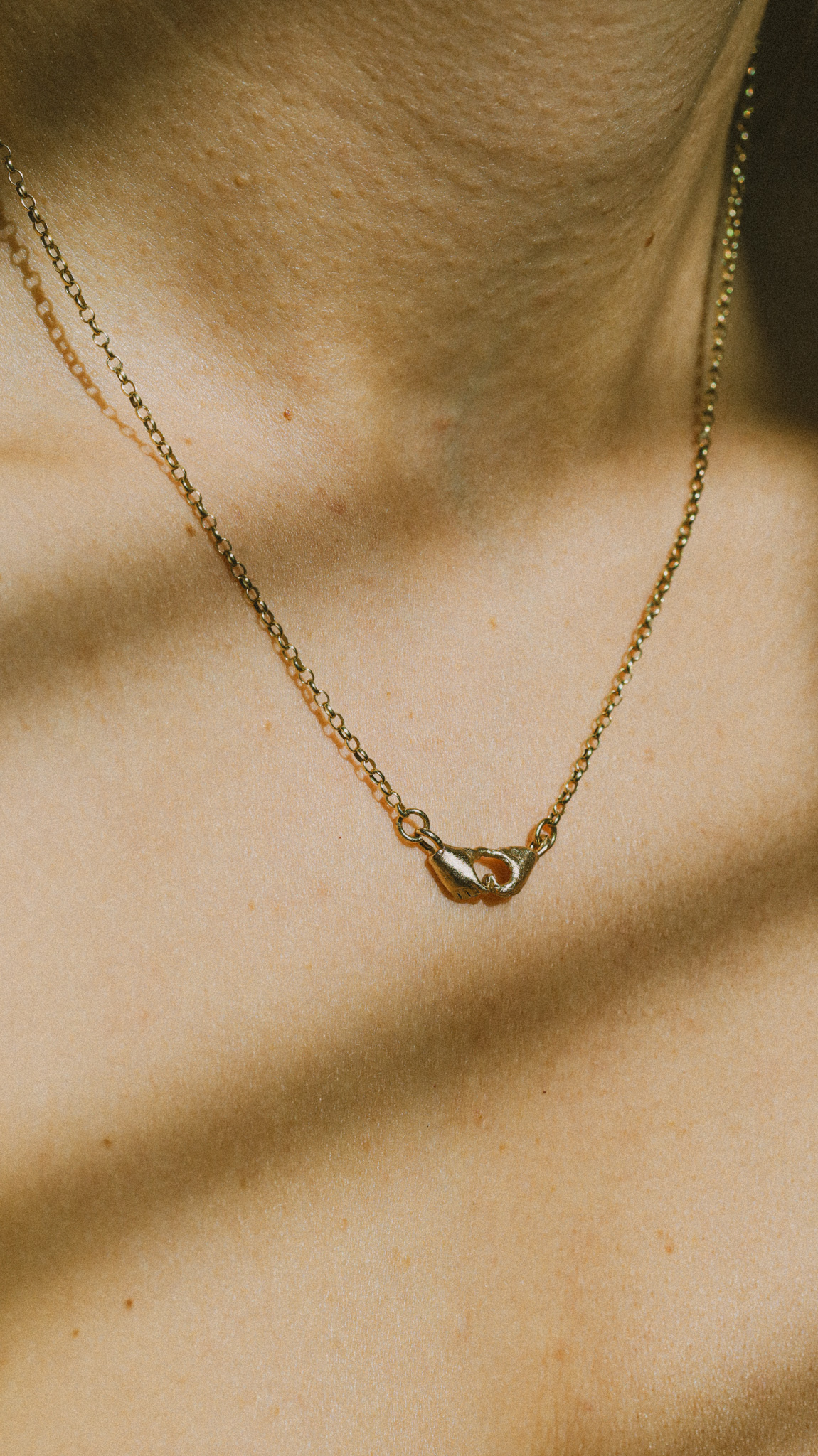 A Quiet Bond | Hand Heart Gold Necklace - Image 2